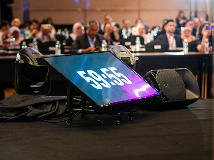 Stage TV Teleprompter screen on the floor showing countdown numbers.
